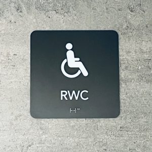 Taktil skylt för RWC-toalett